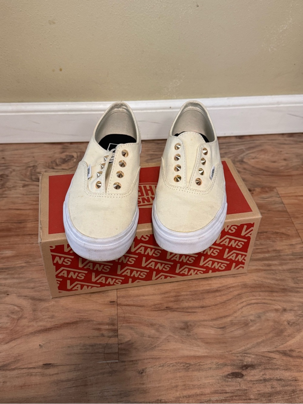 Vans Slip-On Sneakers in Cream with Gold Studs